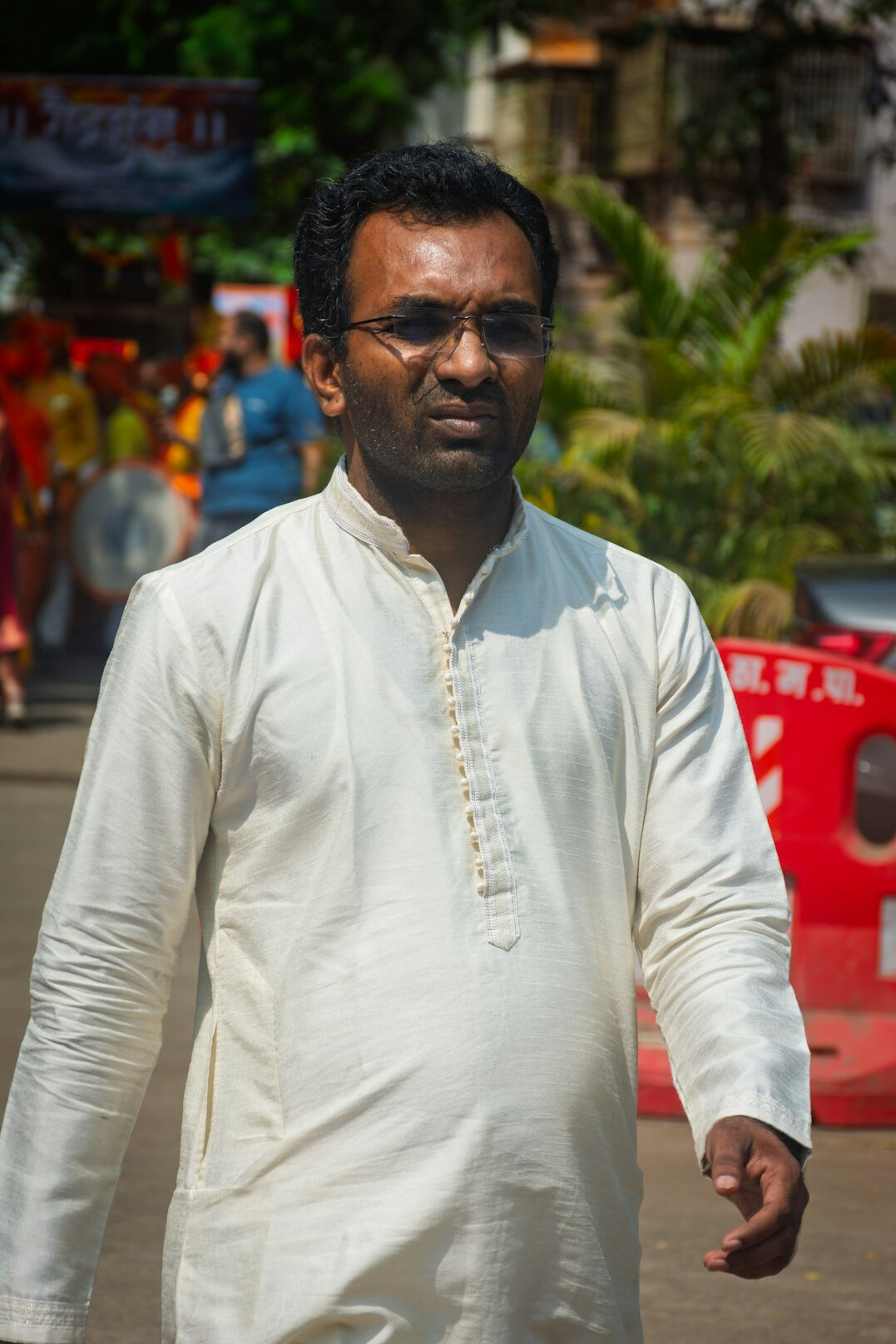 Portrait of a South Asian man with glasses
